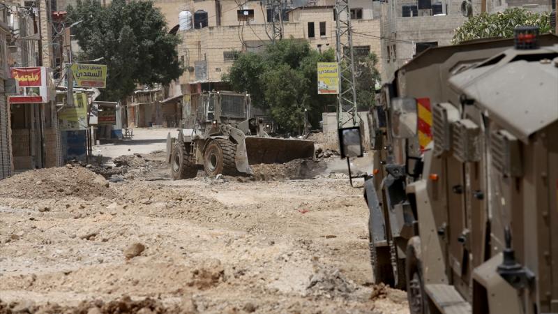 شاركت جرافات عسكرية تابعة للاحتلال في تدمير البنى التحتية بمخيم جنين - الأناضول